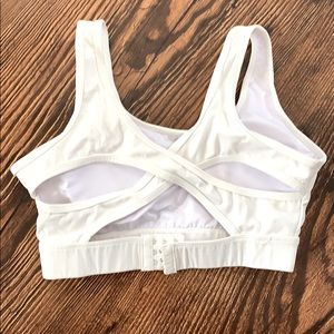 White NVGTN sports bra. Size M.